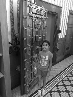 Little Girl in Door Way of Vault